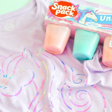 Make the coolest unicorn shirt using this free unicorn SVG file that can be cut on your Silhouette or Cricut machine. Use your Cricut EasyPress to adhere the holographic HTV and enjoy your unicorn Snack Packs as you rock your awesome unicorn shirt. #unicornsvg #unicornshirt #cricutmade #silhouettecameo #freesvgfile #unicorncraft #kidsshirt #diytshirt