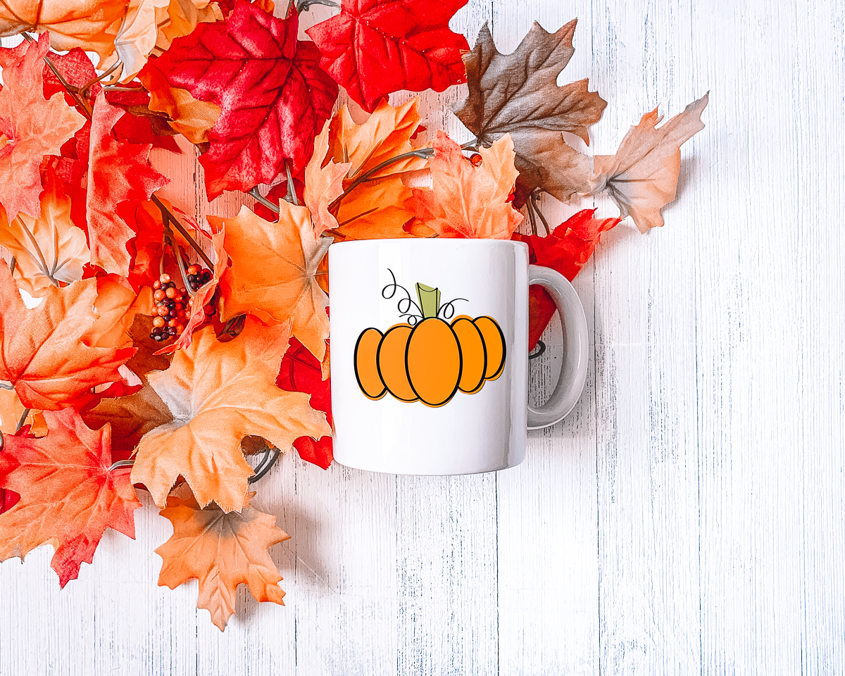 fall pumpkin on a coffee mug